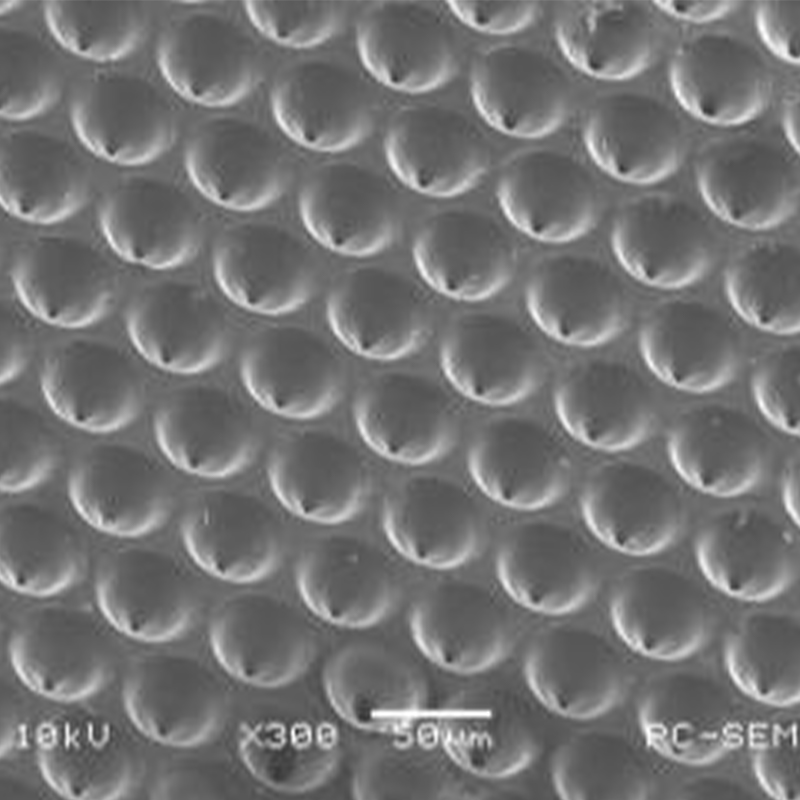 Precision laser microvias